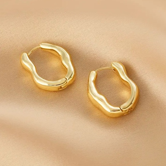Anthropologie Jewelry - Gold wavy abstract hoop earrings ✨